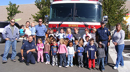 Kids with firemen